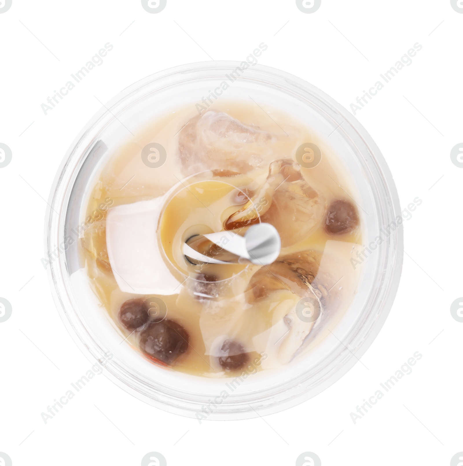 Photo of Tasty milk bubble tea in plastic cup isolated on white, top view