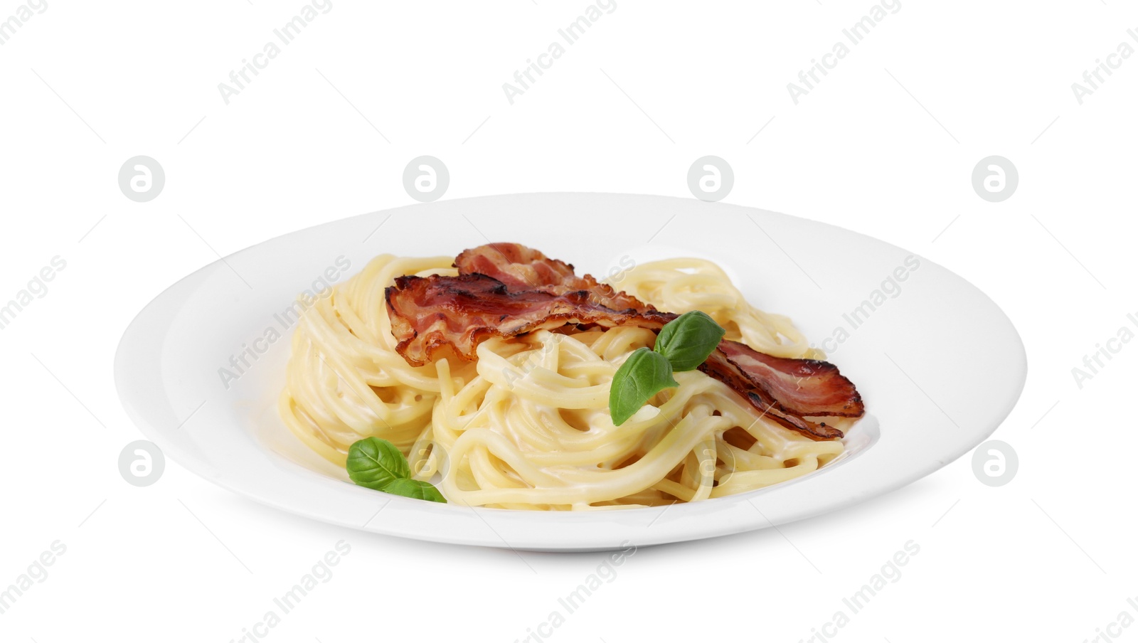 Photo of Delicious pasta Carbonara with bacon and basil isolated on white