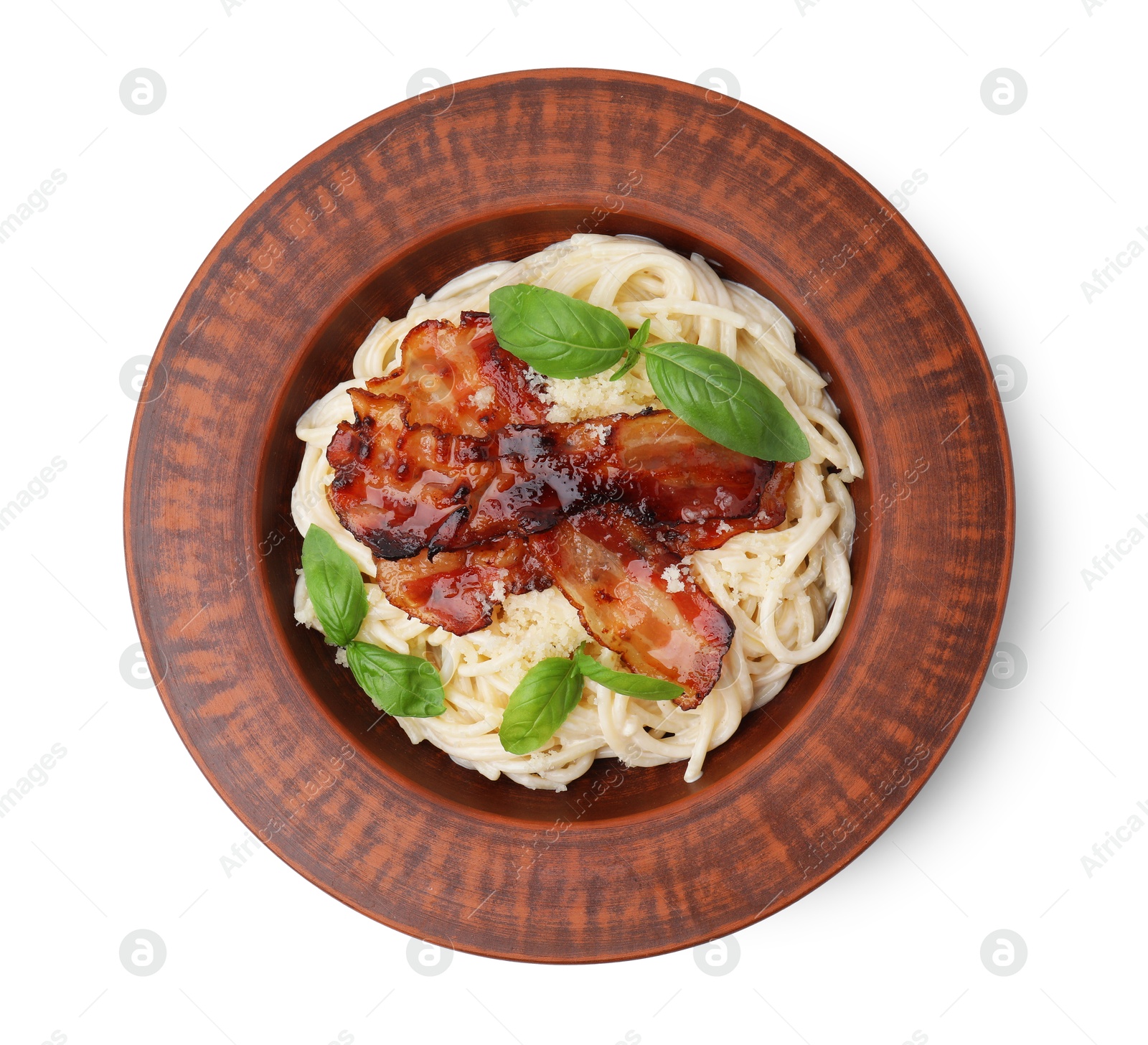 Photo of Delicious pasta Carbonara with bacon and basil isolated on white, top view