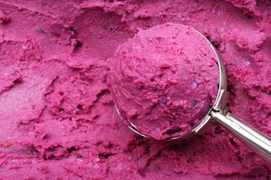 Photo of Scoop of tasty berry sorbet, closeup view