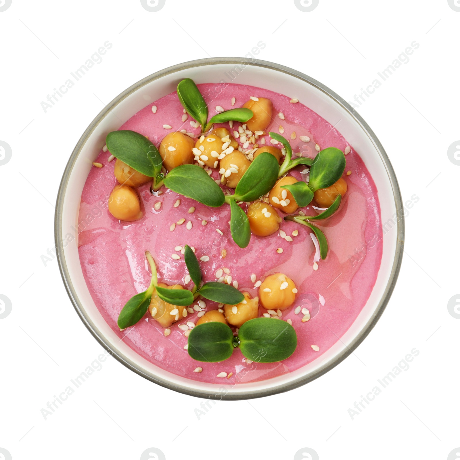 Photo of Tasty beetroot hummus and chickpeas in bowl isolated on white, top view