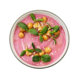 Photo of Tasty beetroot hummus and chickpeas in bowl isolated on white, top view