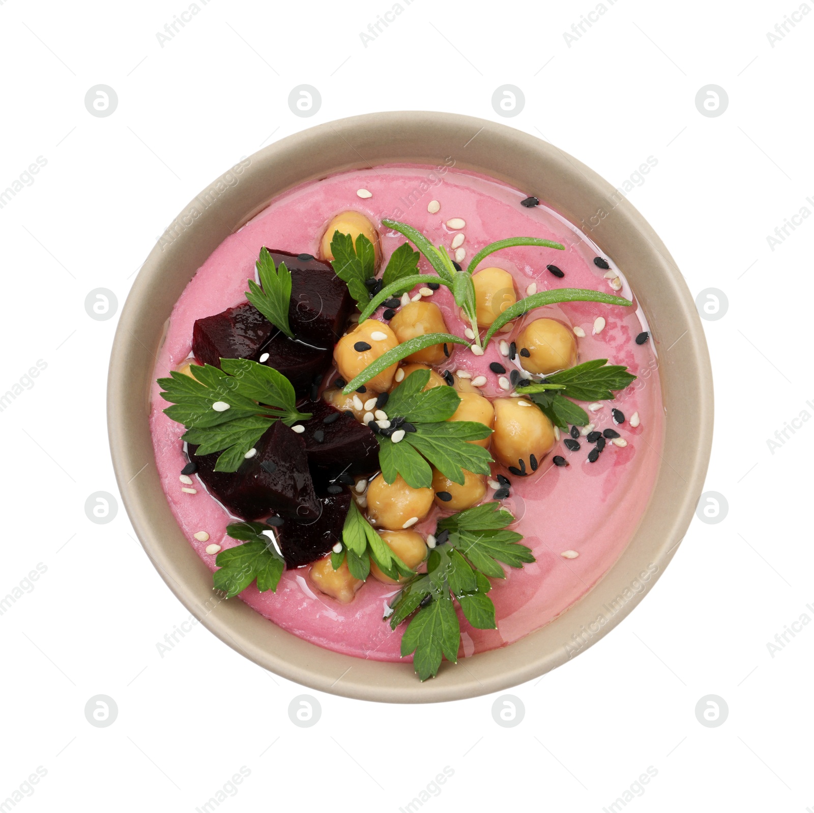 Photo of Tasty beetroot hummus and chickpeas in bowl isolated on white, top view