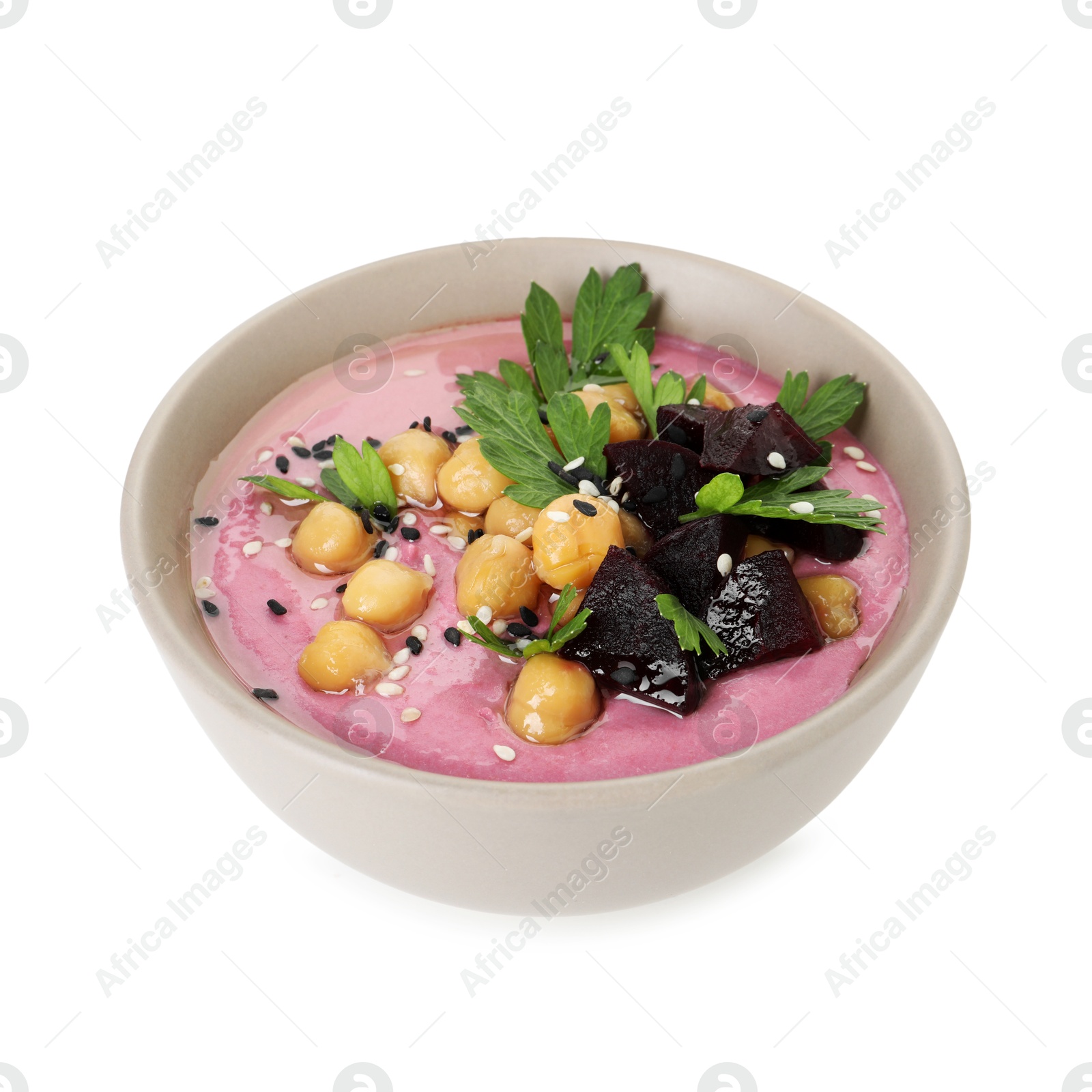 Photo of Tasty beetroot hummus and chickpeas in bowl isolated on white