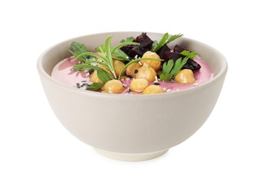 Photo of Tasty beetroot hummus and chickpeas in bowl isolated on white