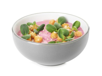 Photo of Tasty beetroot hummus and chickpeas in bowl isolated on white