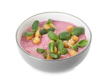 Photo of Tasty beetroot hummus and chickpeas in bowl isolated on white