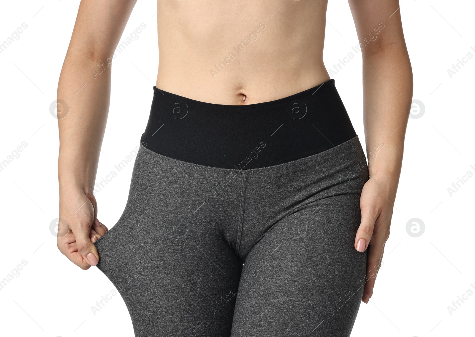 Photo of Woman wearing sports leggings on white background, closeup