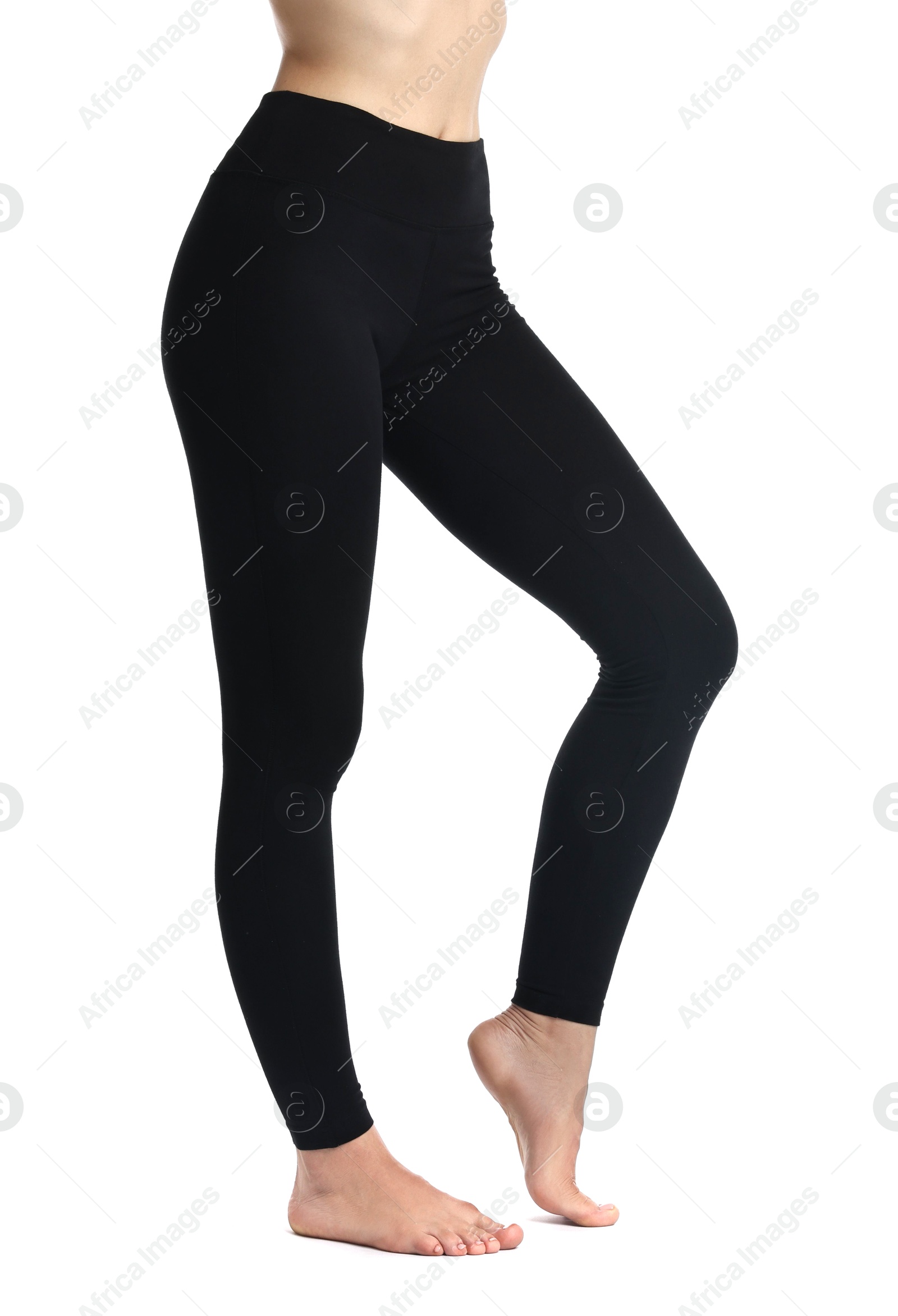 Photo of Woman wearing black sports leggings on white background, closeup