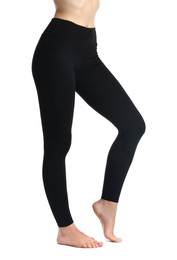 Photo of Woman wearing black sports leggings on white background, closeup