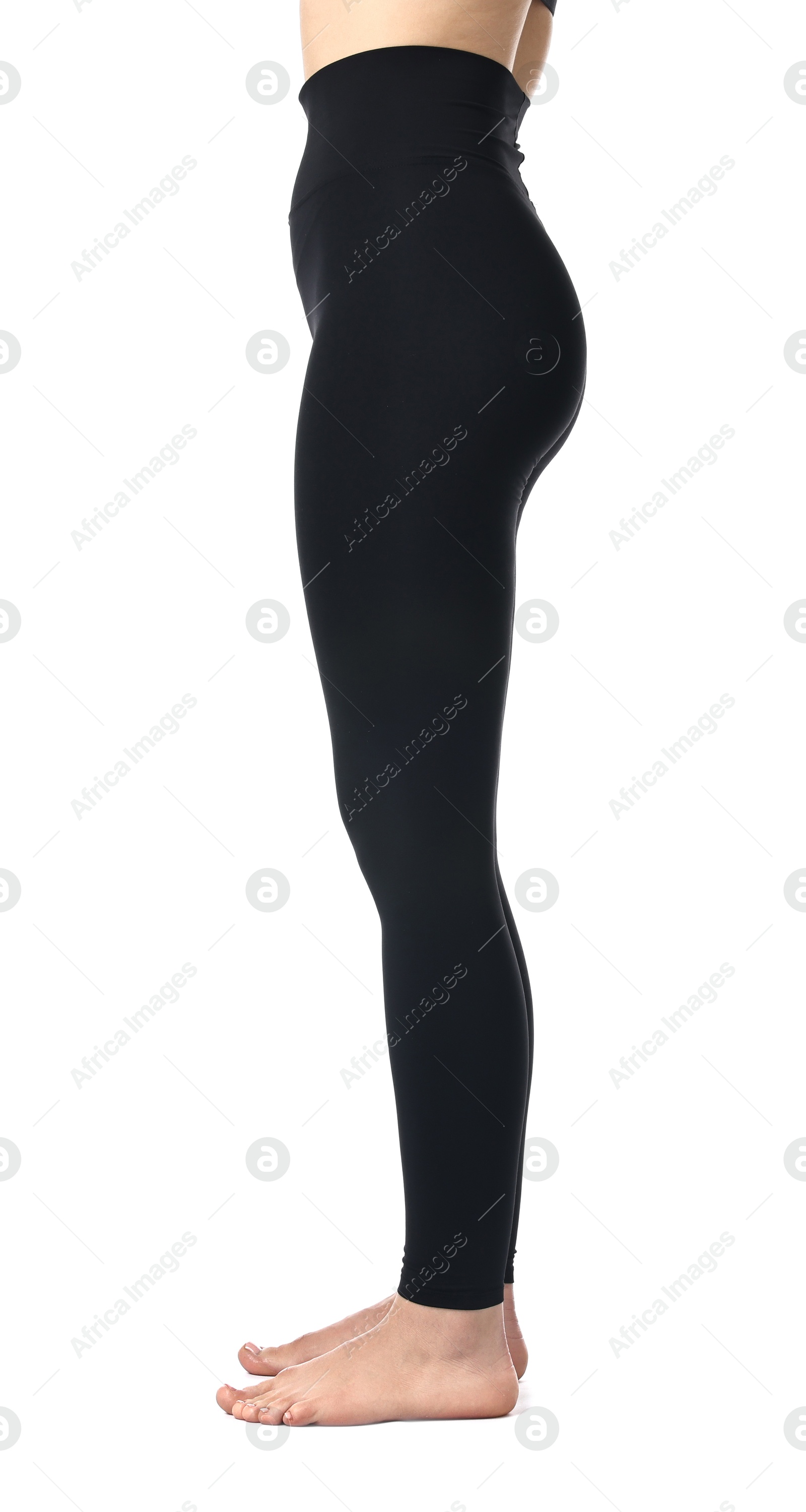 Photo of Woman wearing black sports leggings on white background, closeup