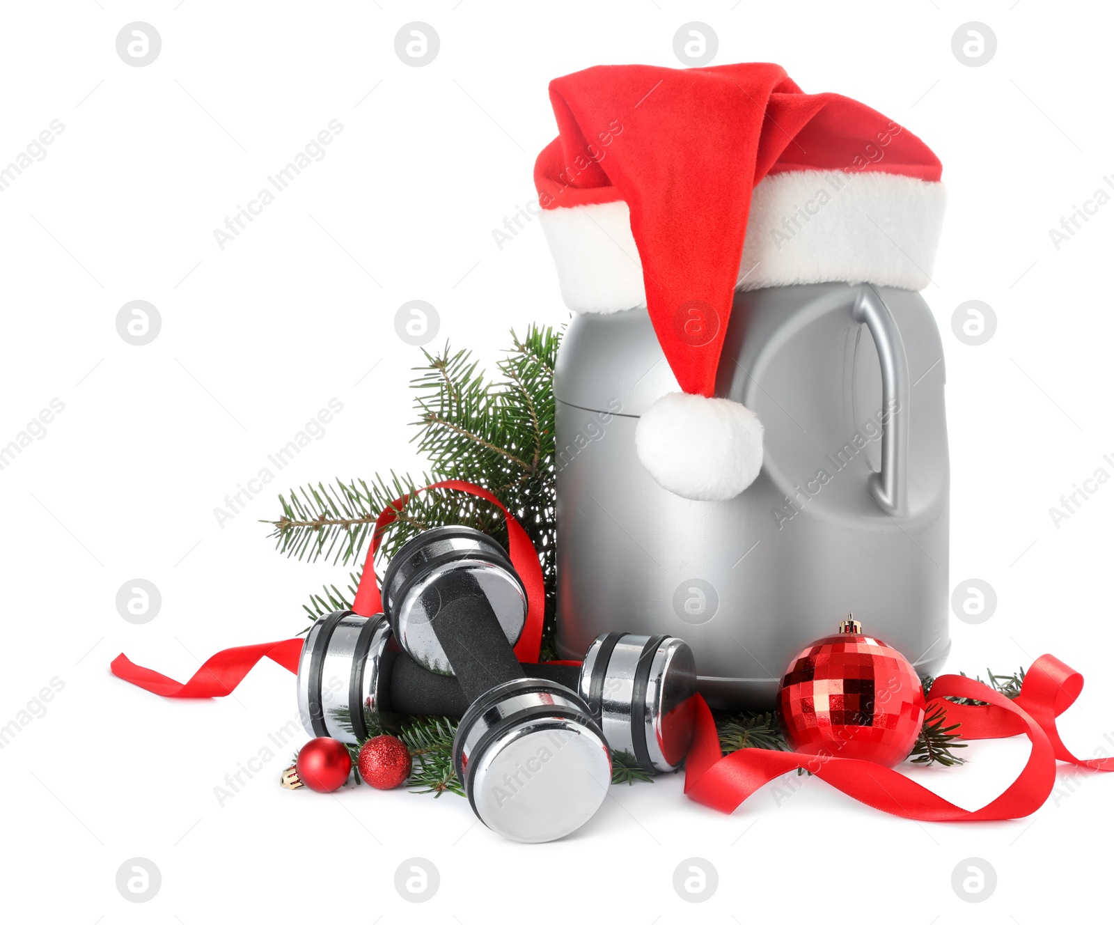 Photo of Dumbbells, container with supplement and Christmas decor isolated on white