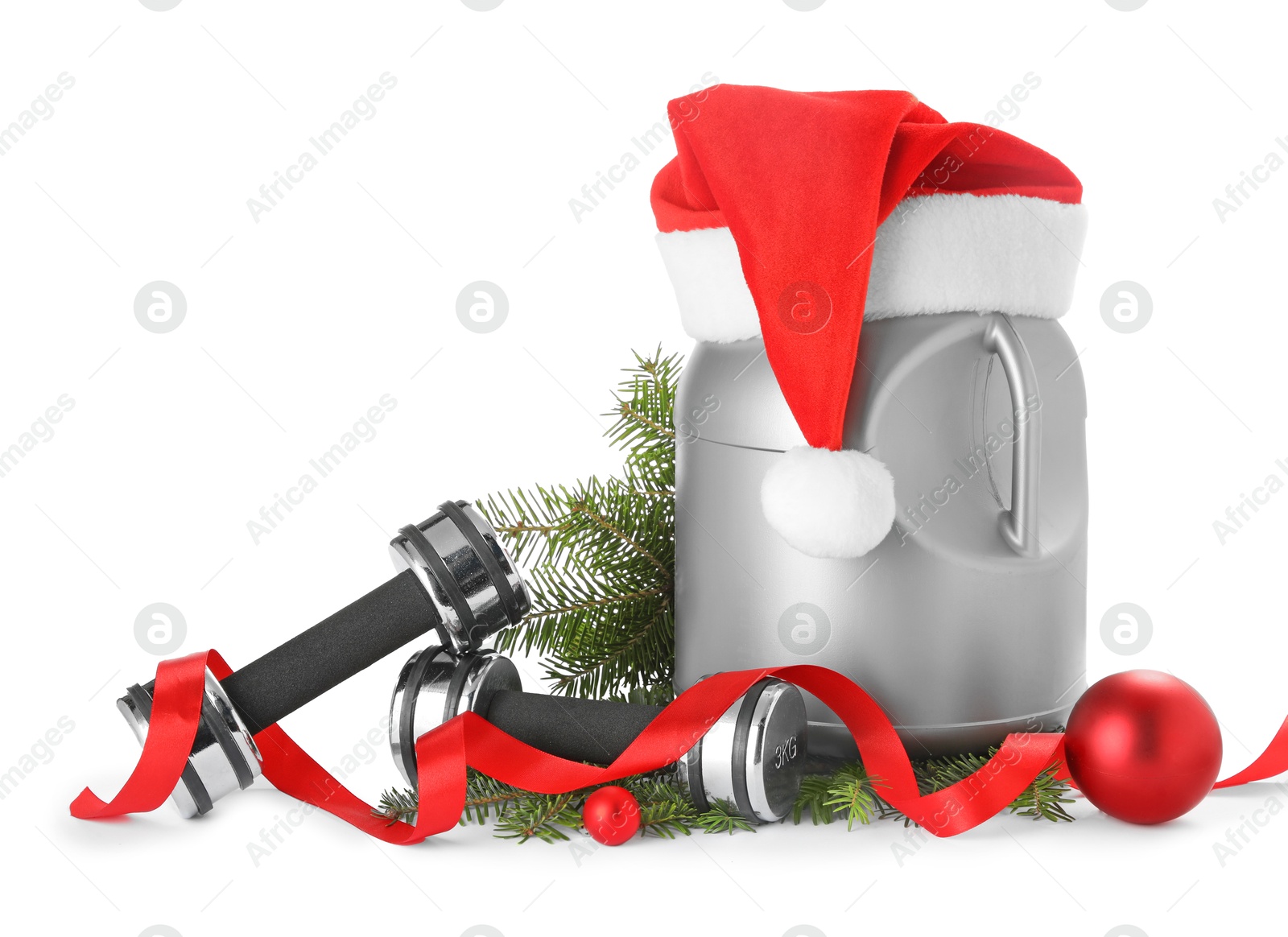 Photo of Dumbbells, container with supplement and Christmas decor isolated on white