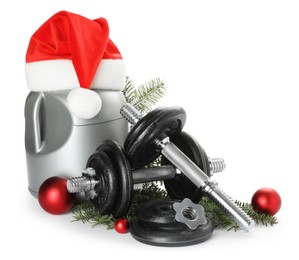 Photo of Dumbbells, container with supplement and Christmas decor isolated on white