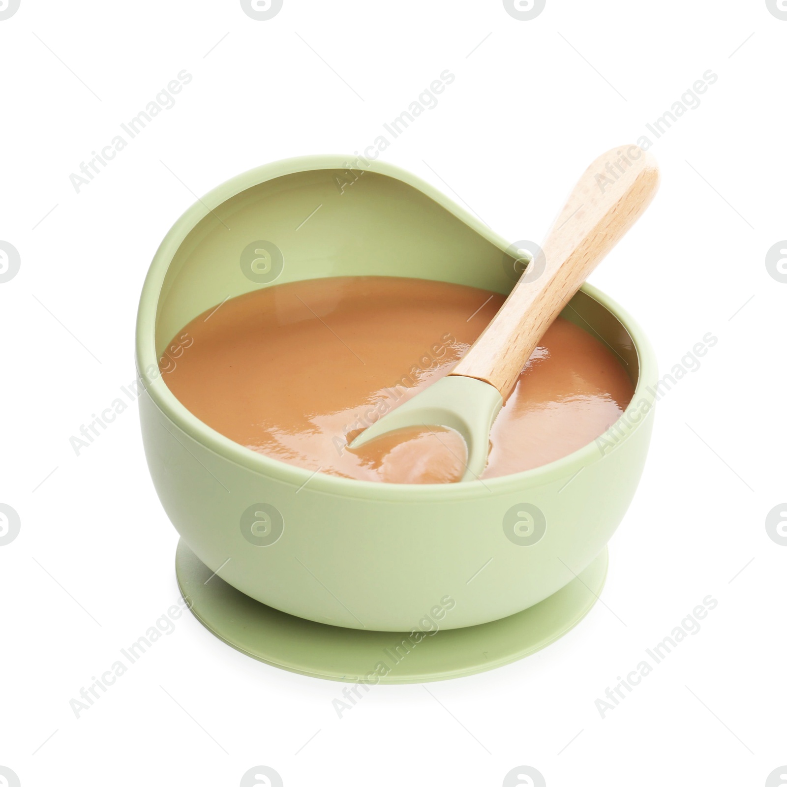 Photo of Delicious baby food in bowl and spoon isolated on white