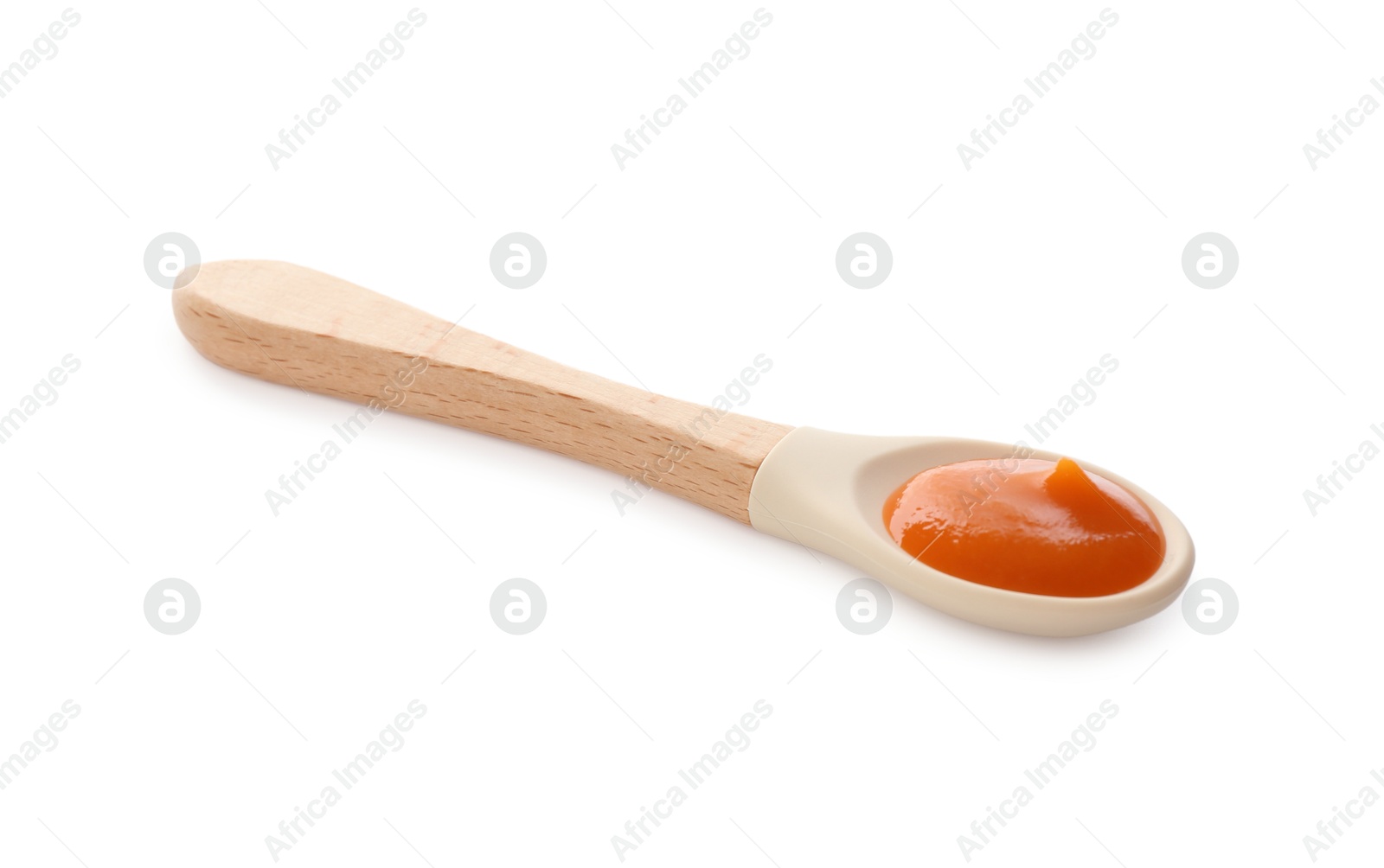 Photo of Delicious baby food in spoon isolated on white