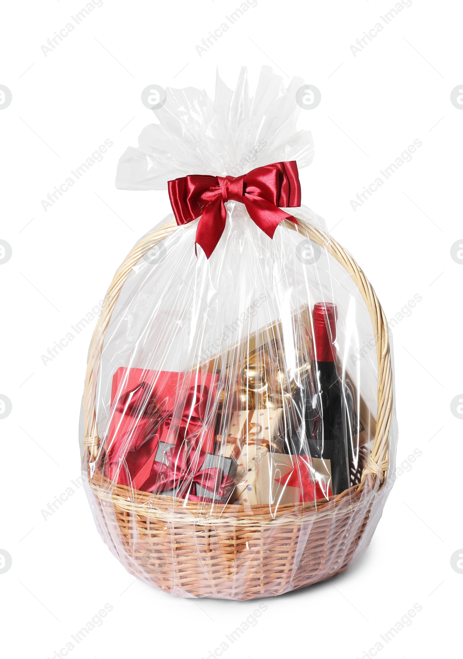 Photo of Wicker gift basket with wine isolated on white