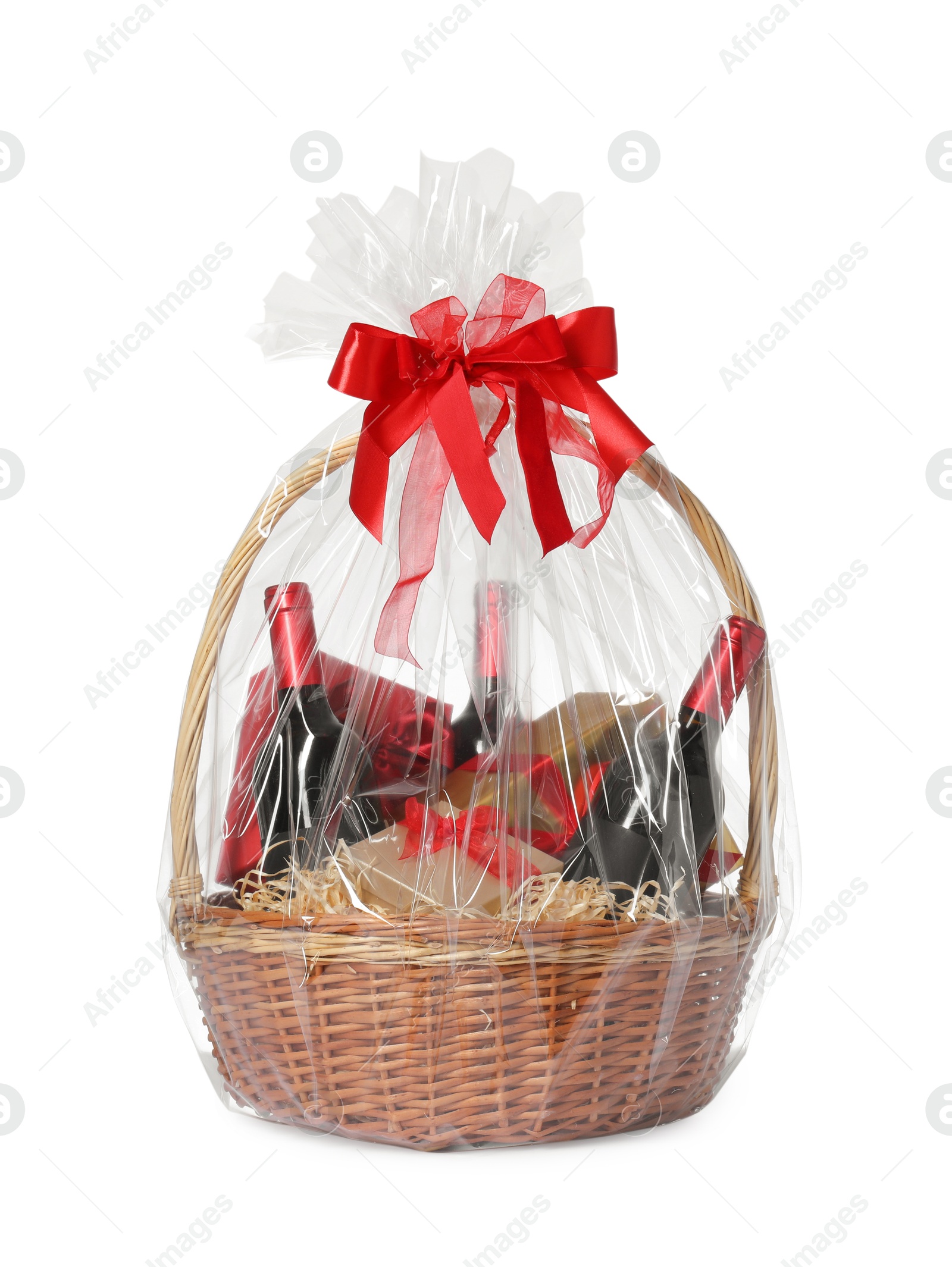 Photo of Wicker gift basket with wine isolated on white