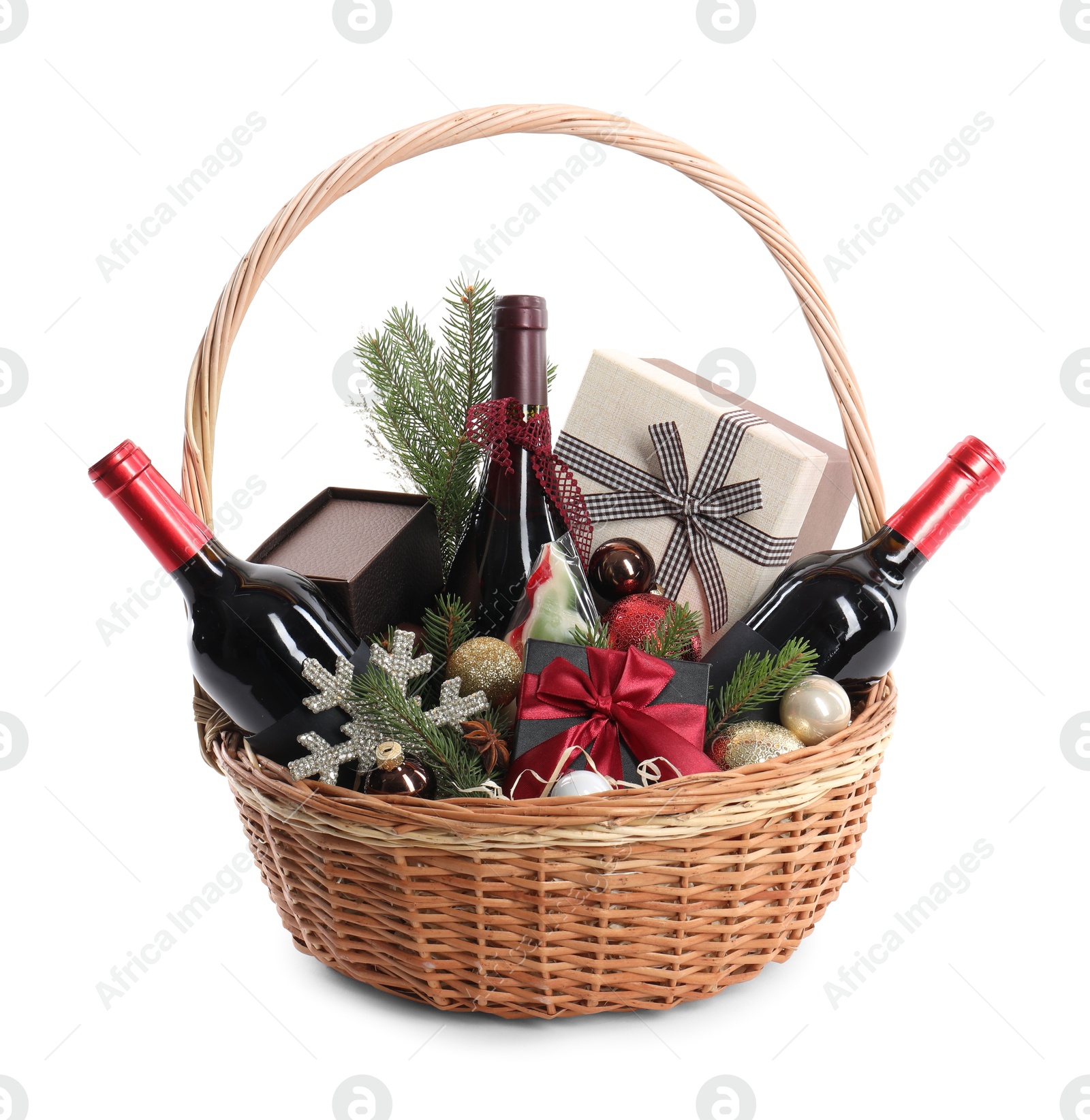 Photo of Wicker gift basket with sparkling wine isolated on white