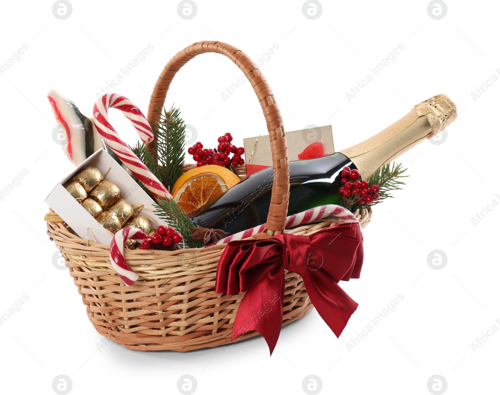 Photo of Wicker gift basket with sparkling wine isolated on white