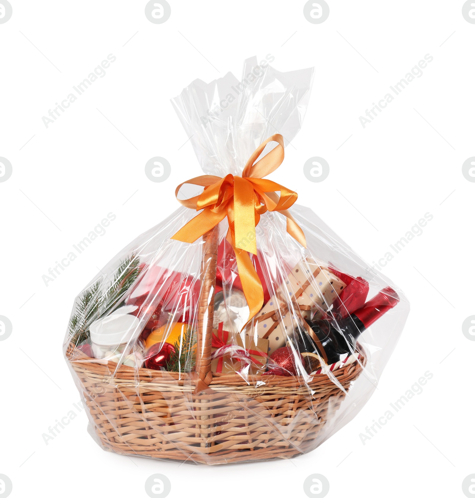 Photo of Wicker gift basket with sparkling wine isolated on white