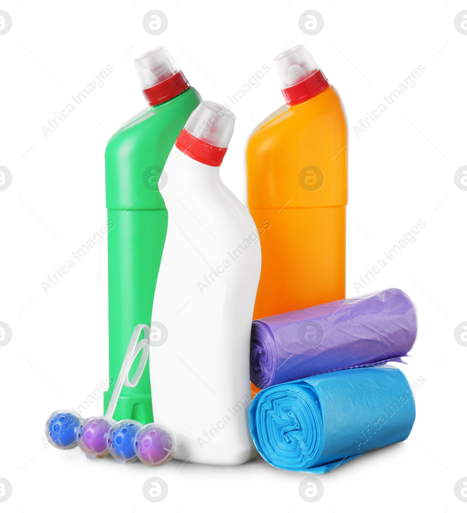 Photo of Different toilet cleaners and trash bags on wooden table against white background