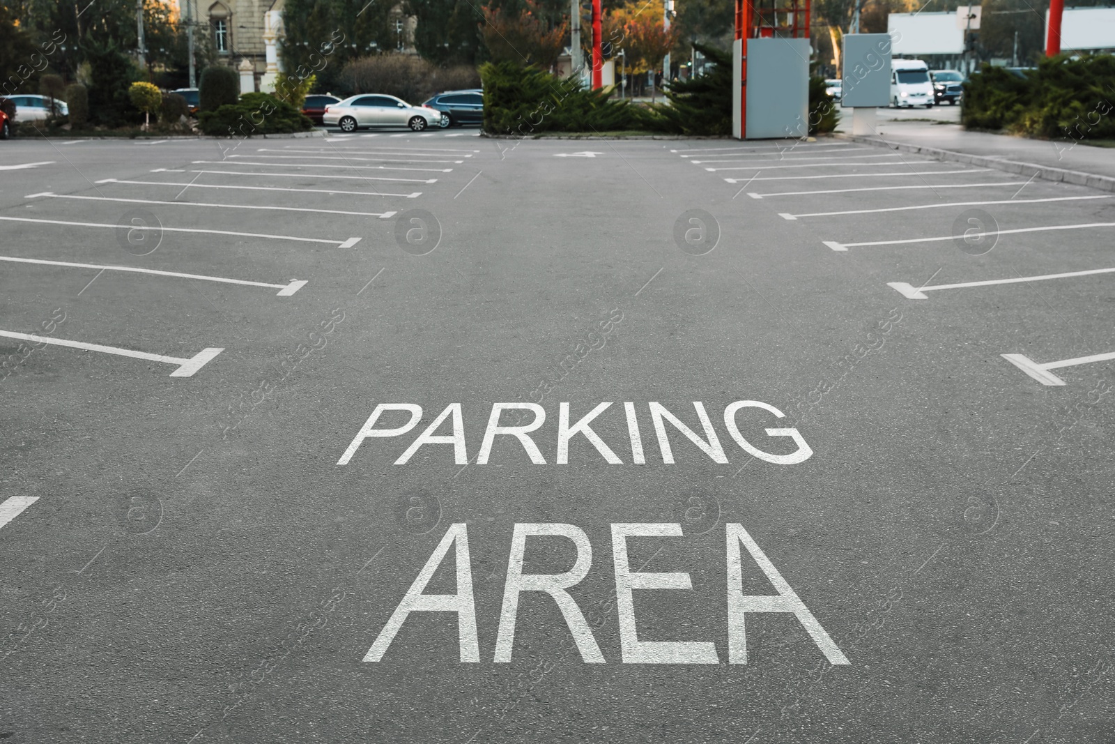 Image of Empty outdoor parking lot with painted markings on asphalt