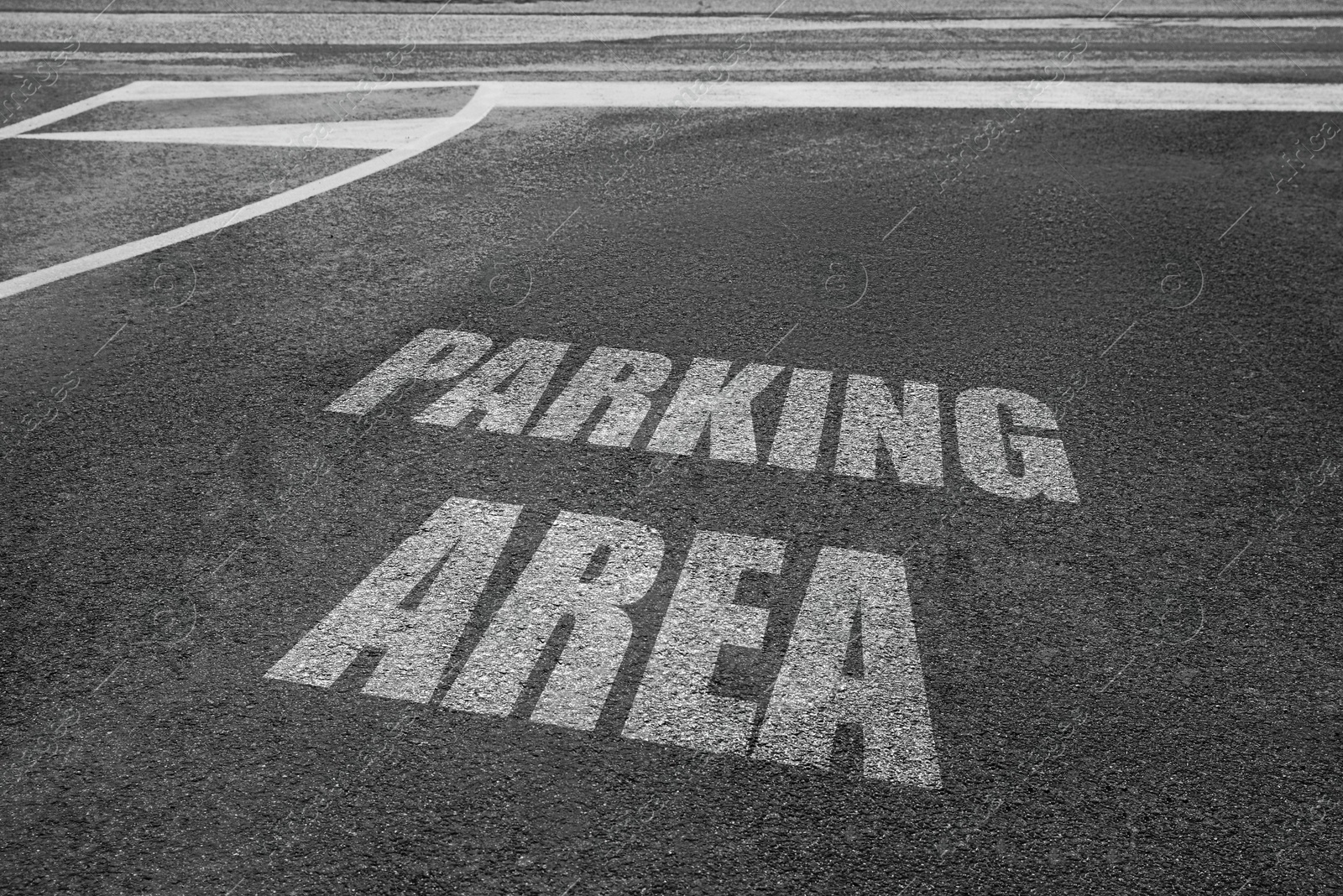 Image of Empty outdoor parking lot with painted markings on asphalt