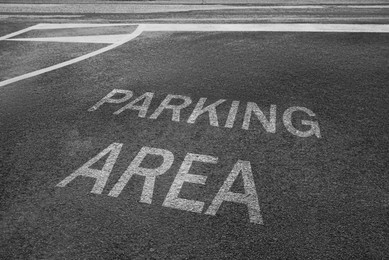 Image of Empty outdoor parking lot with painted markings on asphalt