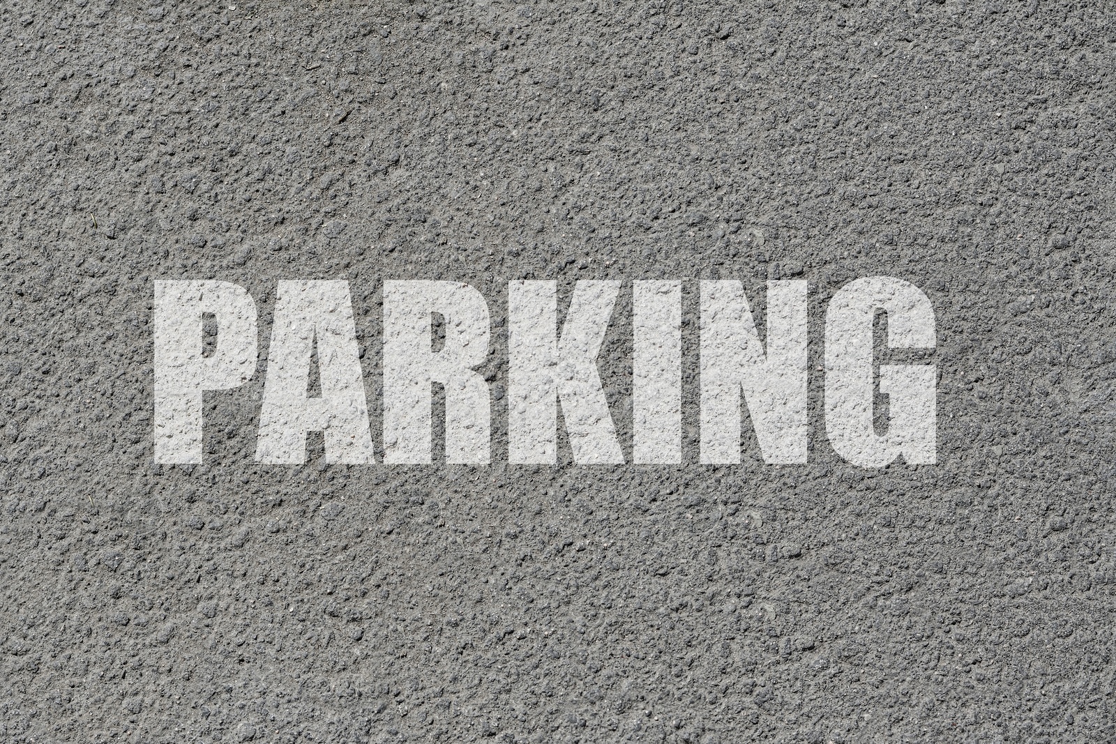 Image of Parking lot. Word Parking written on asphalt, top view