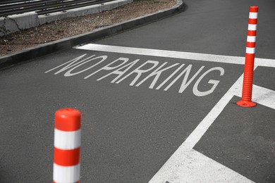 Painted markings of no-parking zone at outdoor parking lot