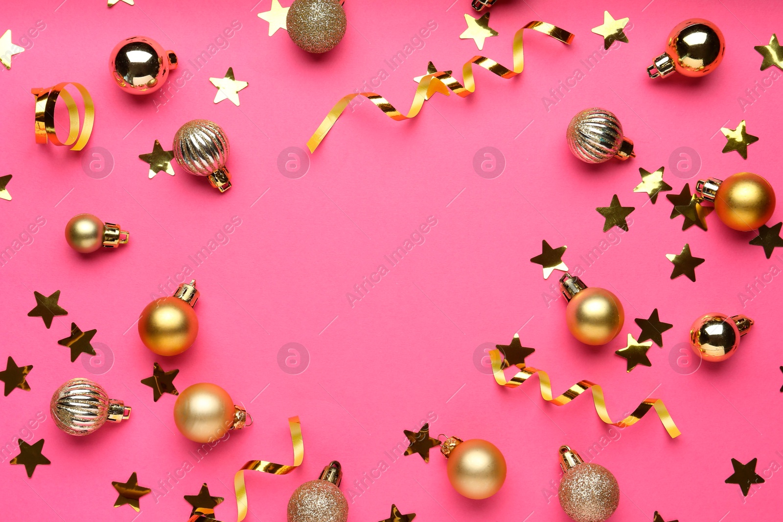 Photo of Confetti and Christmas balls on pink background, flat lay. Space for text