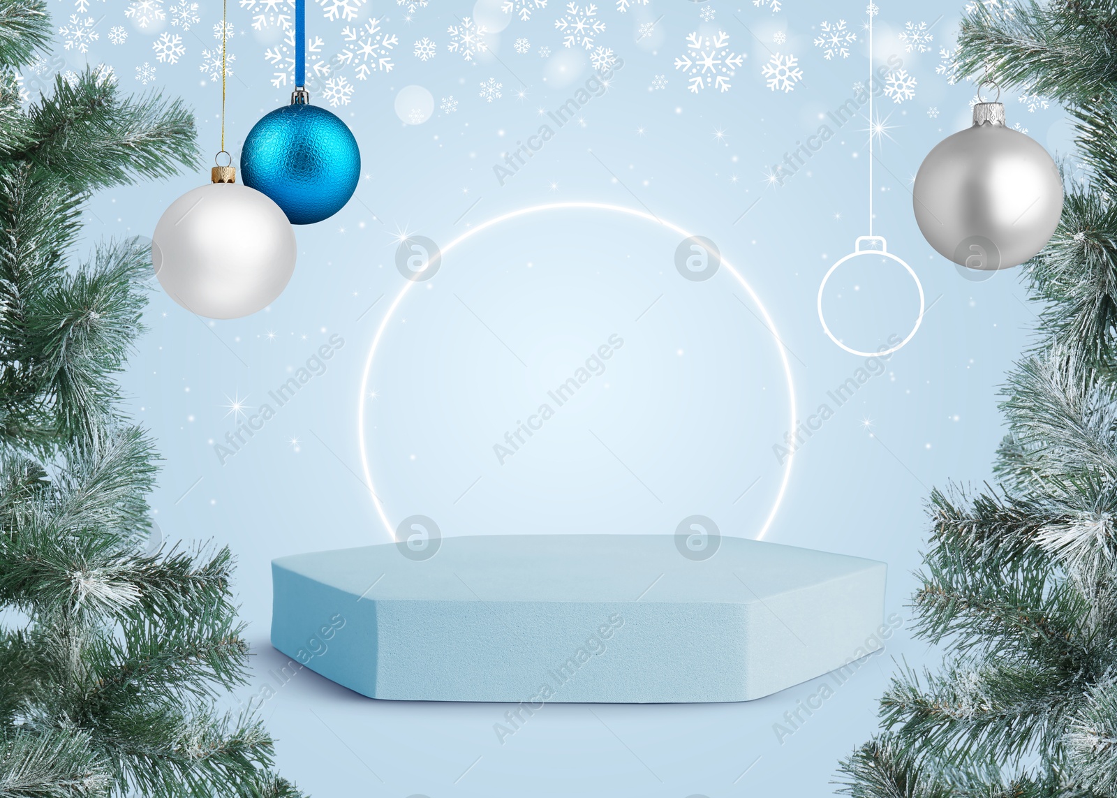 Image of Christmas balls and snowflakes over empty podium on light blue background. Stage for stylish presentation. Xmas poster or sale flyer design