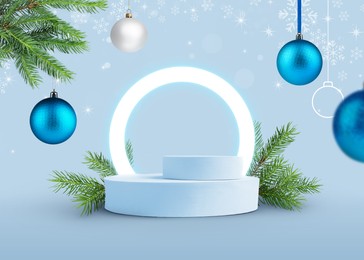 Image of Christmas balls and snowflakes over empty podium on light blue background. Stage for stylish presentation. Xmas poster or sale flyer design