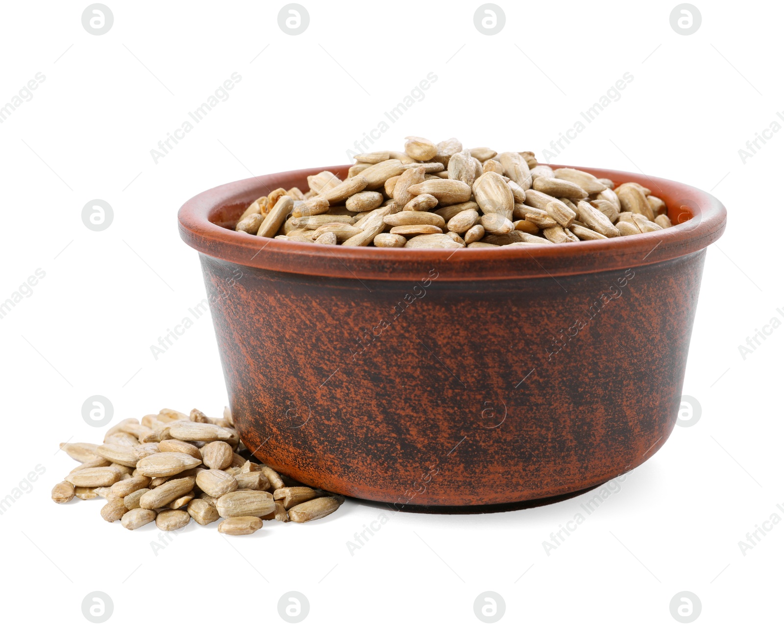 Photo of Peeled sunflower seeds in bowl isolated on white