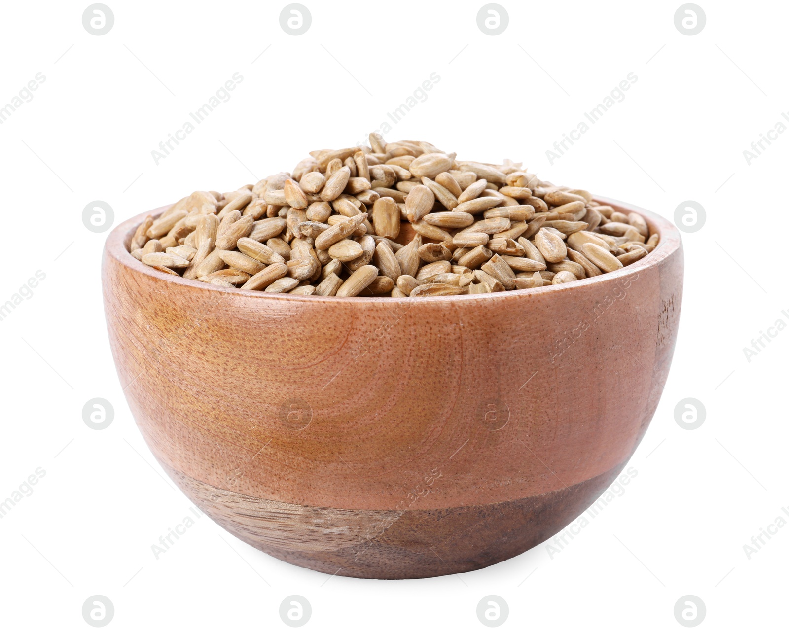 Photo of Peeled sunflower seeds in wooden bowl isolated on white