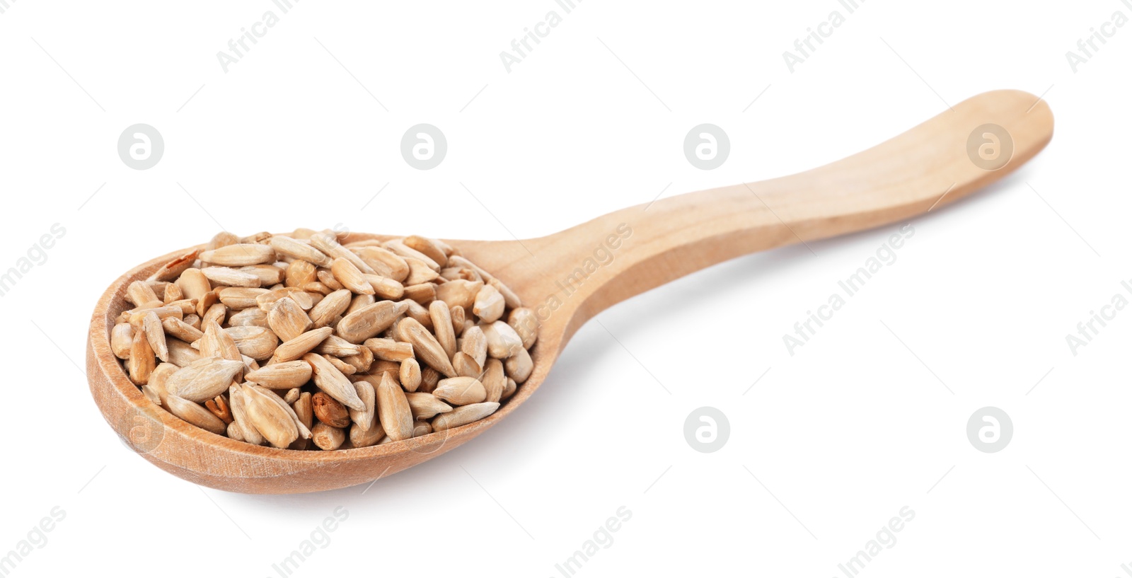 Photo of Peeled sunflower seeds in wooden spoon isolated on white