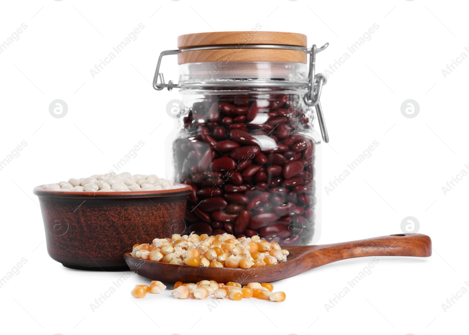 Photo of Different types of legumes and corn kernels isolated on white