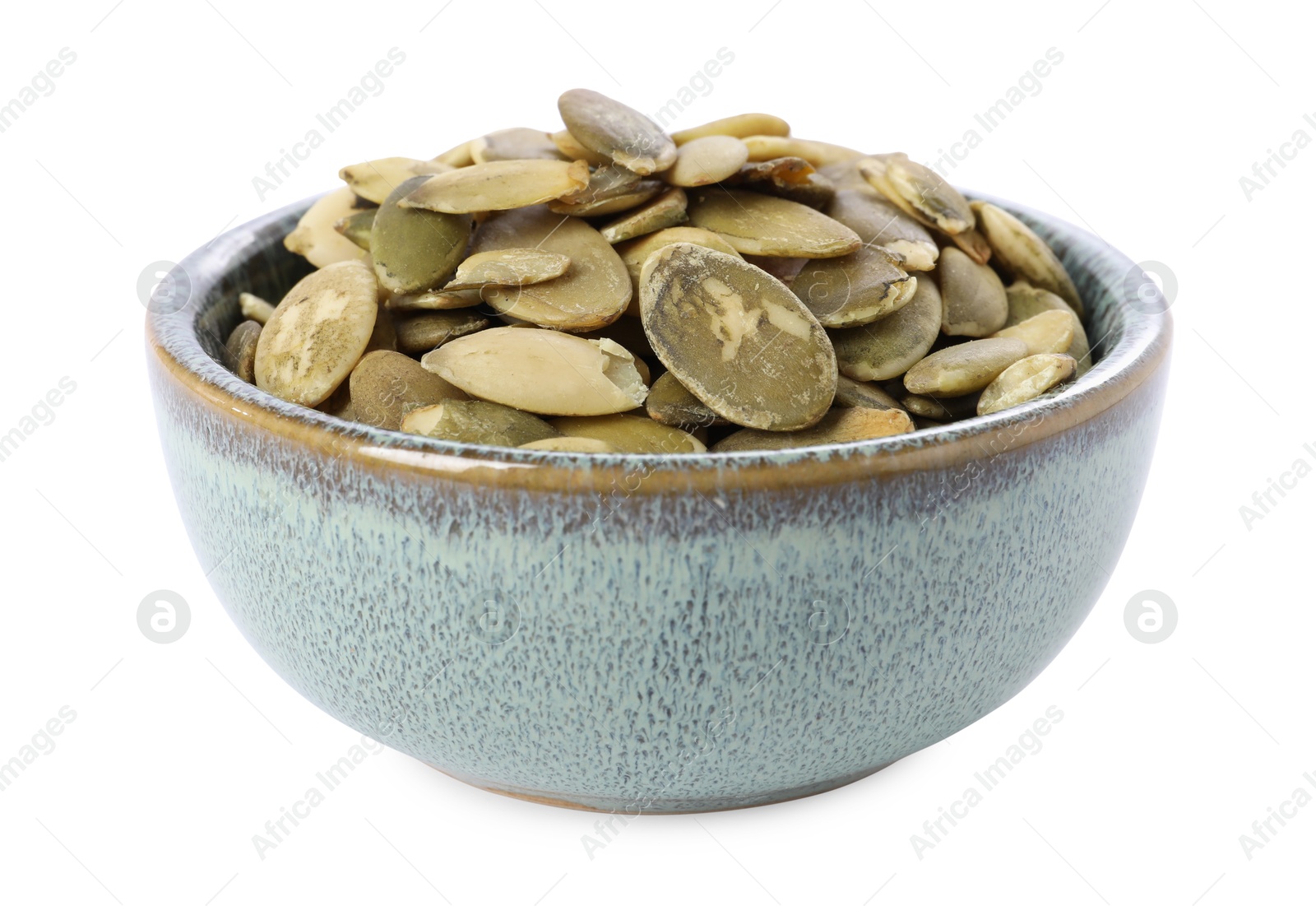 Photo of Peeled pumpkin seeds in bowl isolated on white