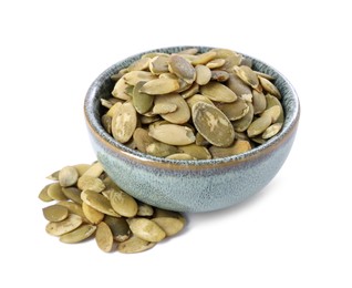 Photo of Peeled pumpkin seeds in bowl isolated on white