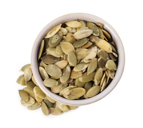 Photo of Peeled pumpkin seeds in bowl isolated on white, top view