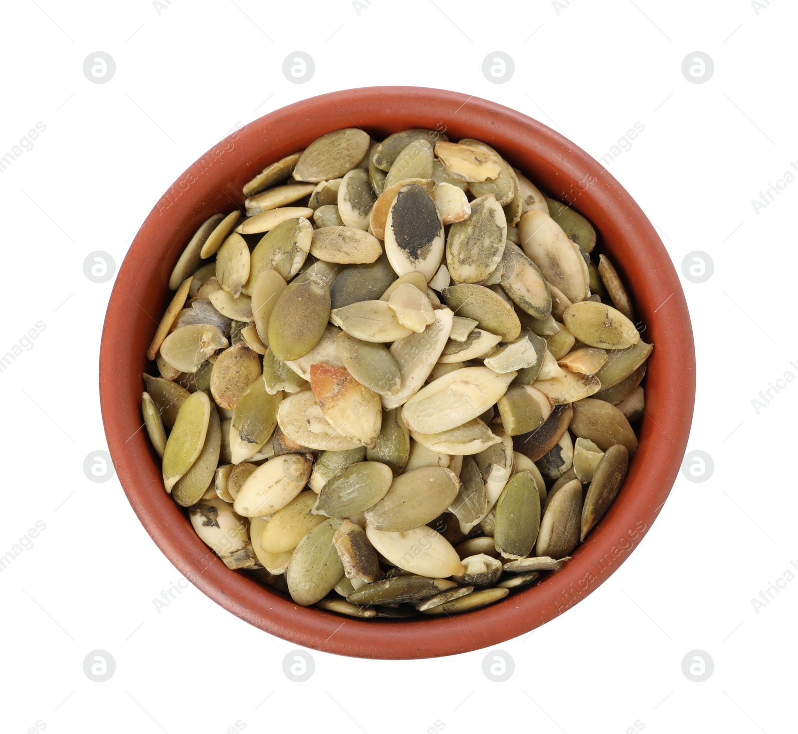 Photo of Peeled pumpkin seeds in bowl isolated on white, top view