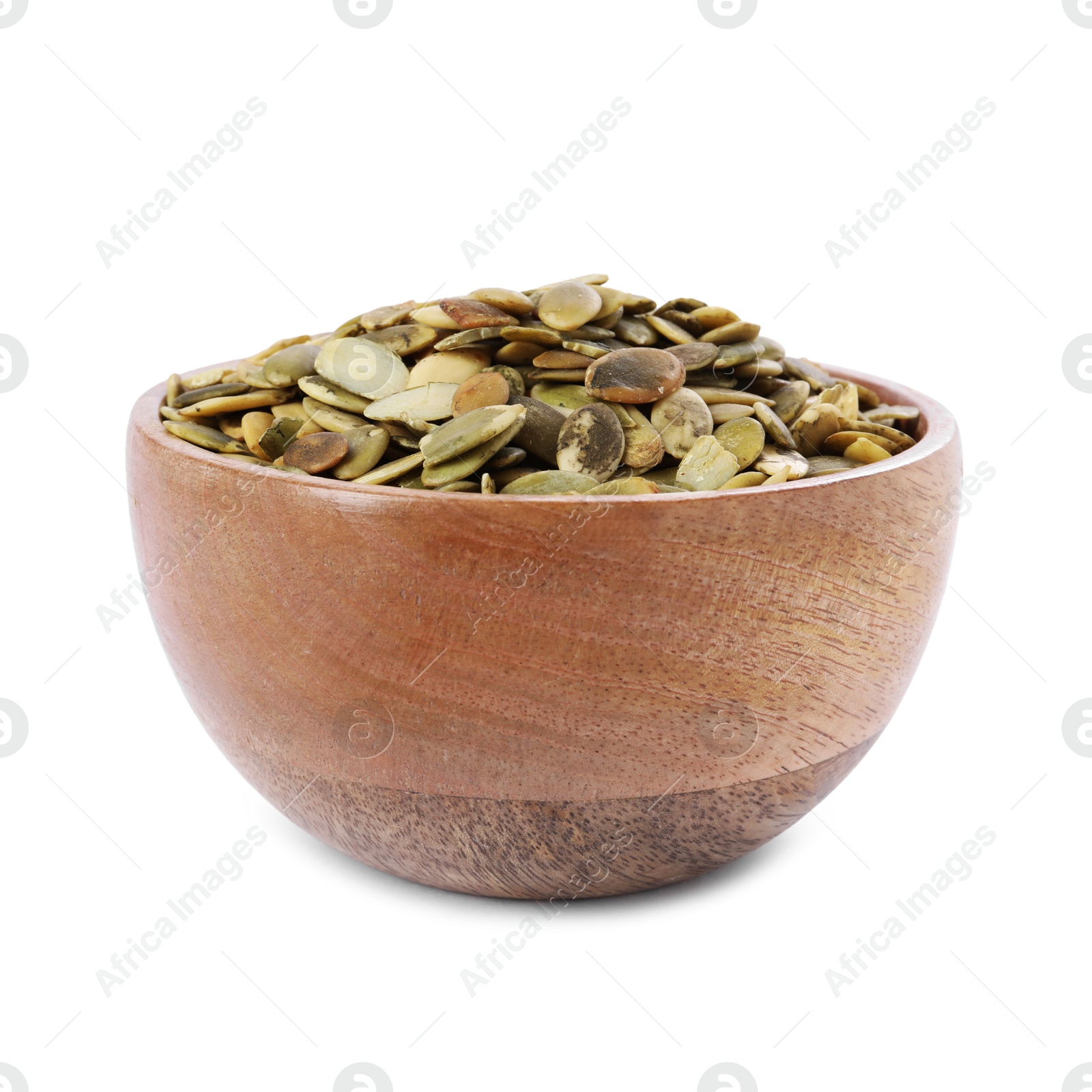 Photo of Peeled pumpkin seeds in wooden bowl isolated on white