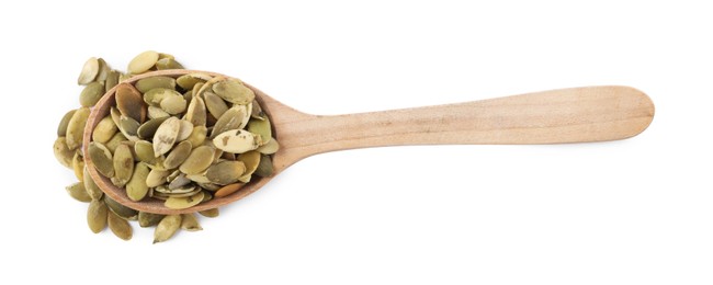 Photo of Peeled pumpkin seeds in wooden spoon isolated on white, top view