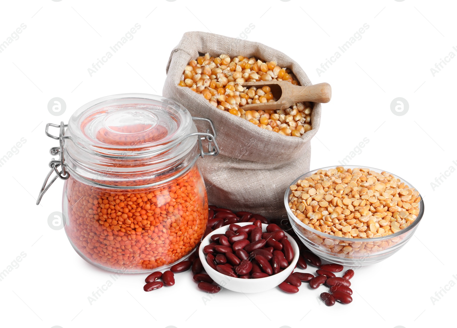 Photo of Different types of legumes and corn kernels isolated on white