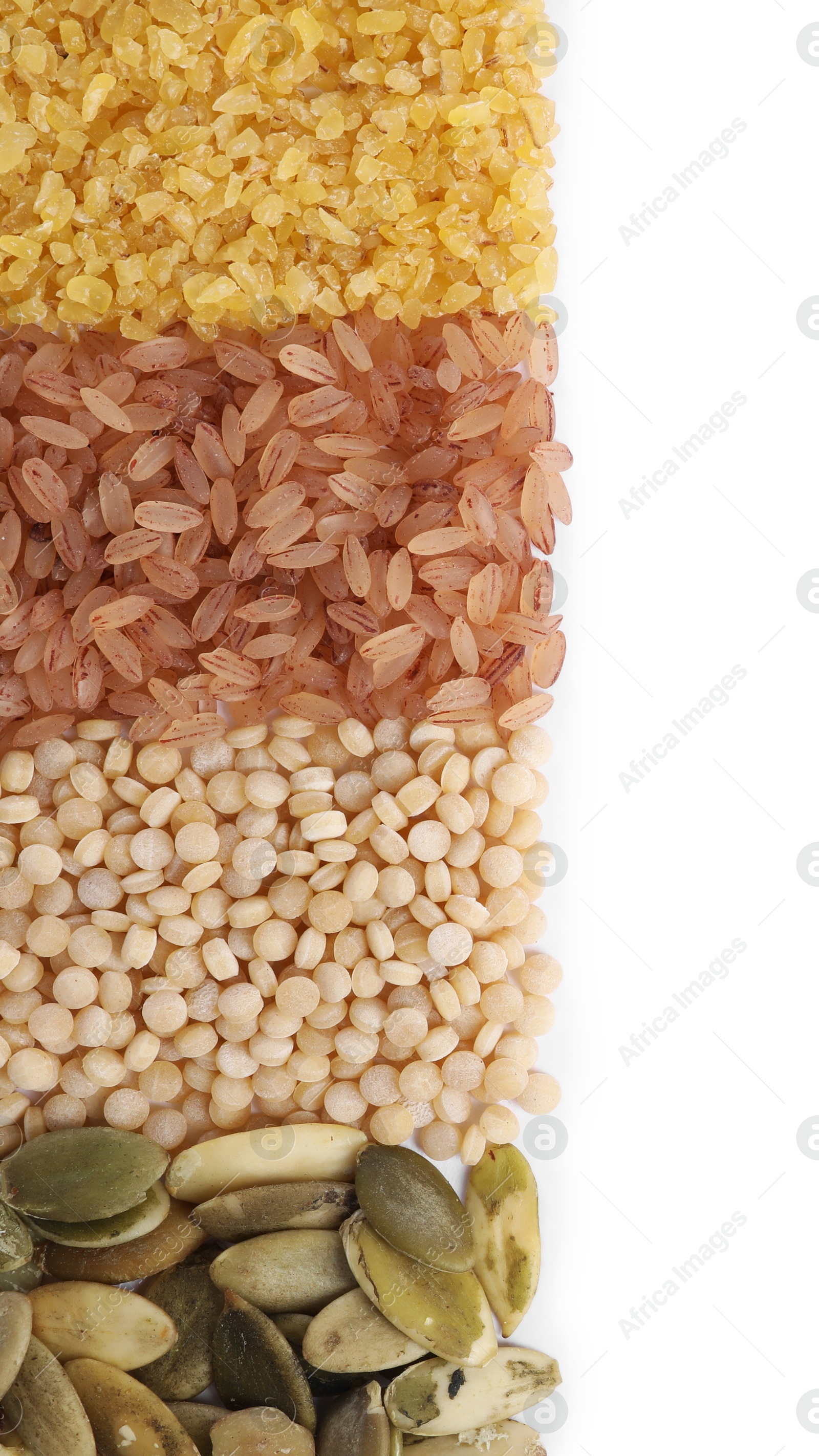 Photo of Different types of cereals, legumes and seeds isolated on white, top view