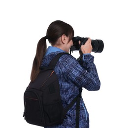 Photo of Photographer with backpack and camera taking picture on white background