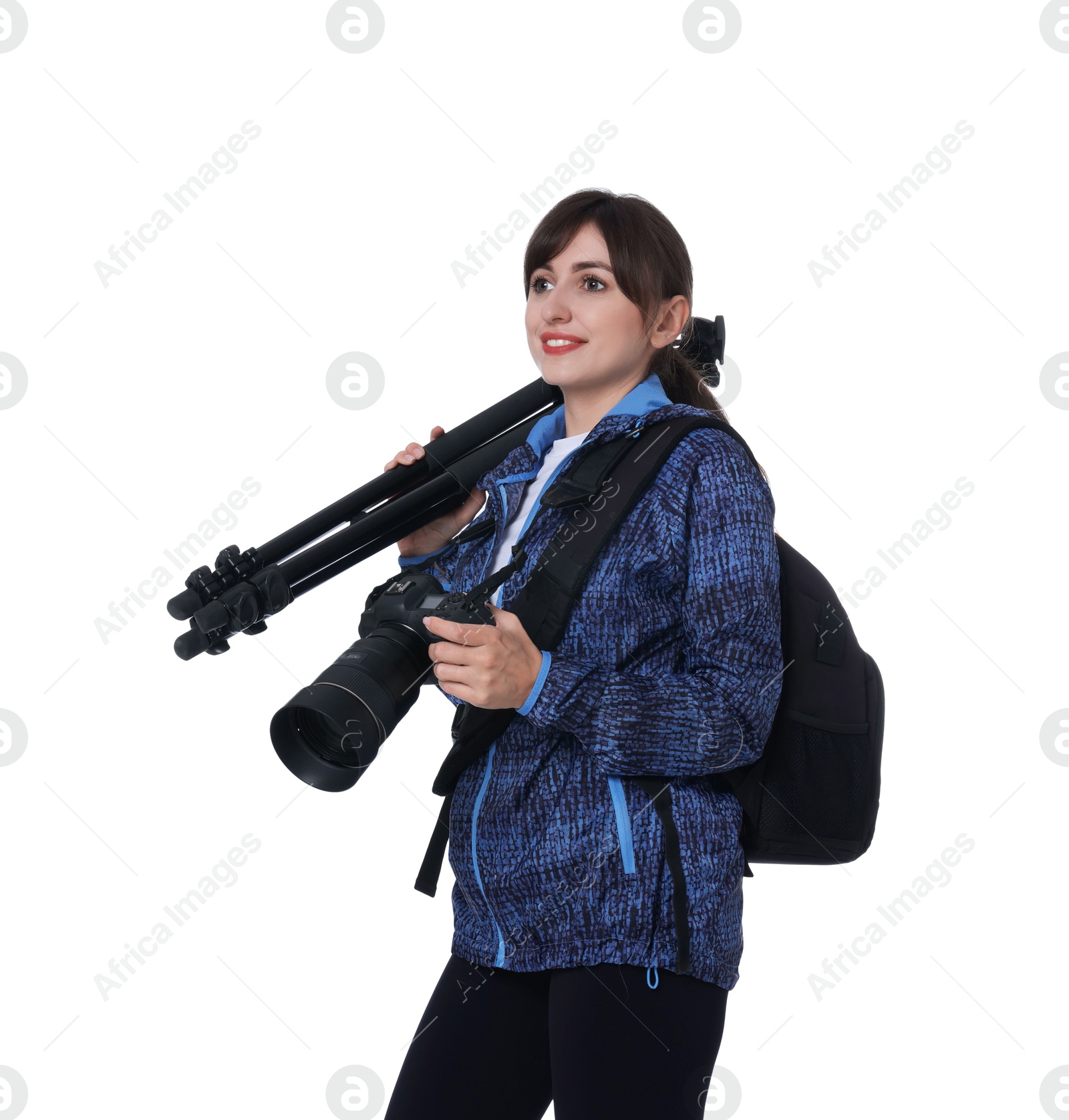 Photo of Photographer with backpack, camera and other professional equipment on white background