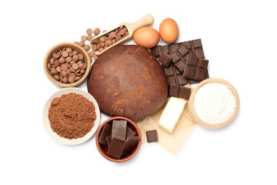 Photo of Chocolate dough and ingredients isolated on white, top view