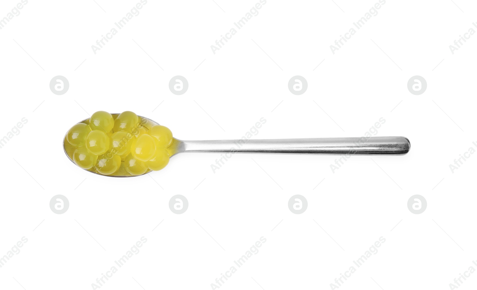 Photo of Bright tapioca pearls in spoon isolated on white, top view